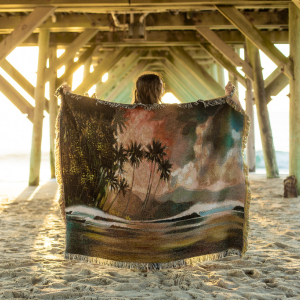 red sky at night, blanket at beach